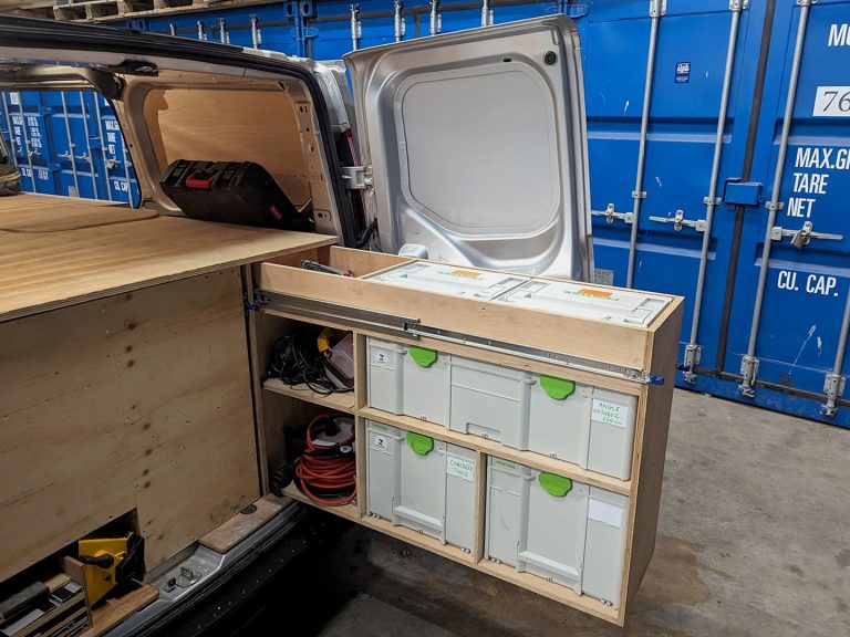 car modifications with customized wooden fittings, including shelves and drawers